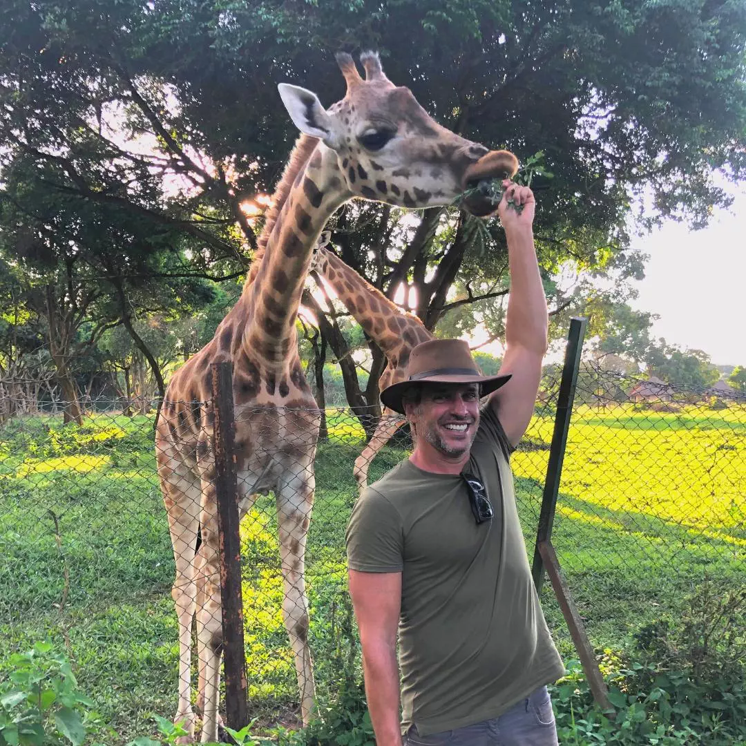 Nanan Travel Uganda Trip - Giraffes feeding