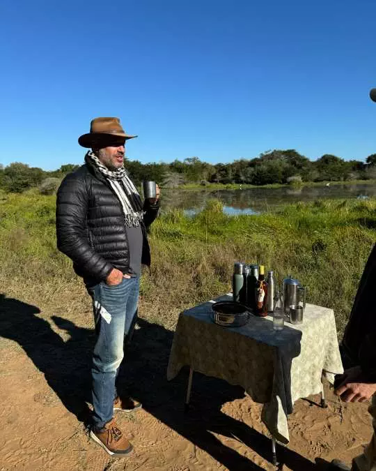 Nanan Travel - Balancing Luxury & Wilderness in African Safaris _ Ultimate Guide (5) Nanan Travel - Balancing Luxury & Wilderness in African Safaris _ Ultimate Guide-safari break German drinking coffee